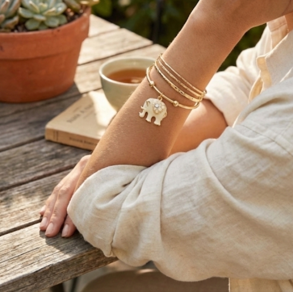 Swarovski Elements Women's Gold And White Elephant Bangle